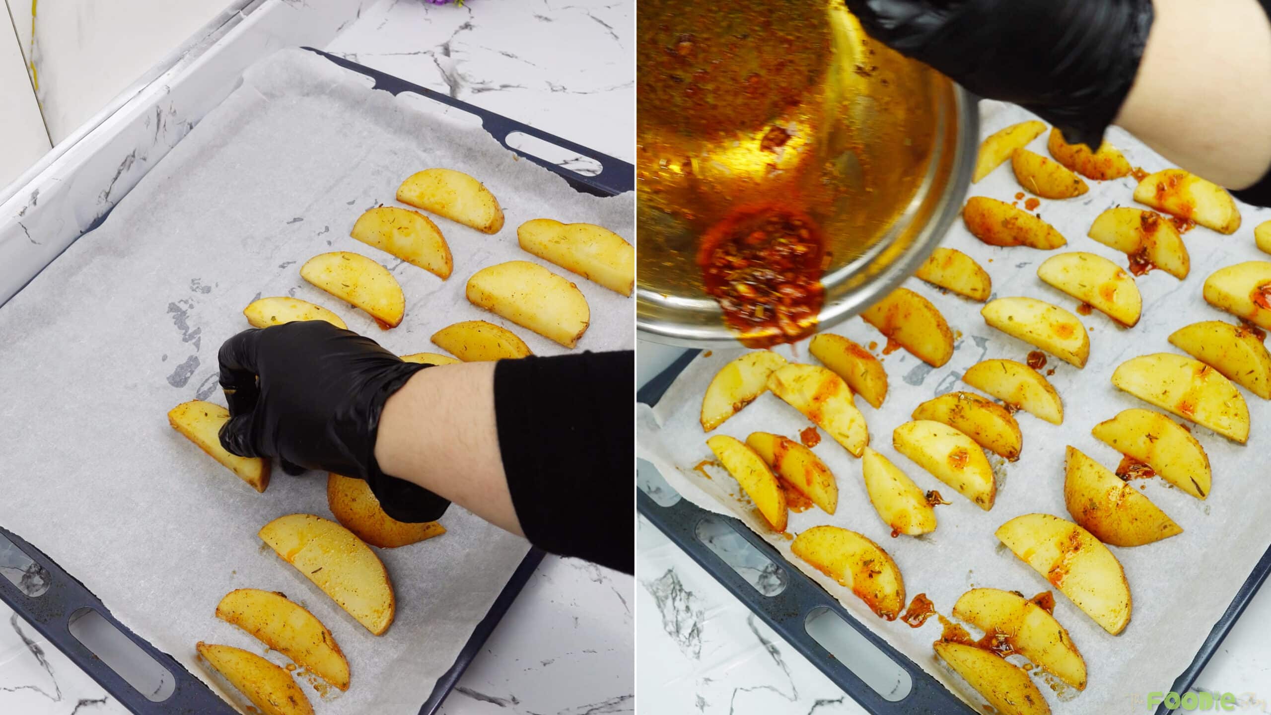 Seasoned potato wedges spaced out on a parchment-lined baking sheet