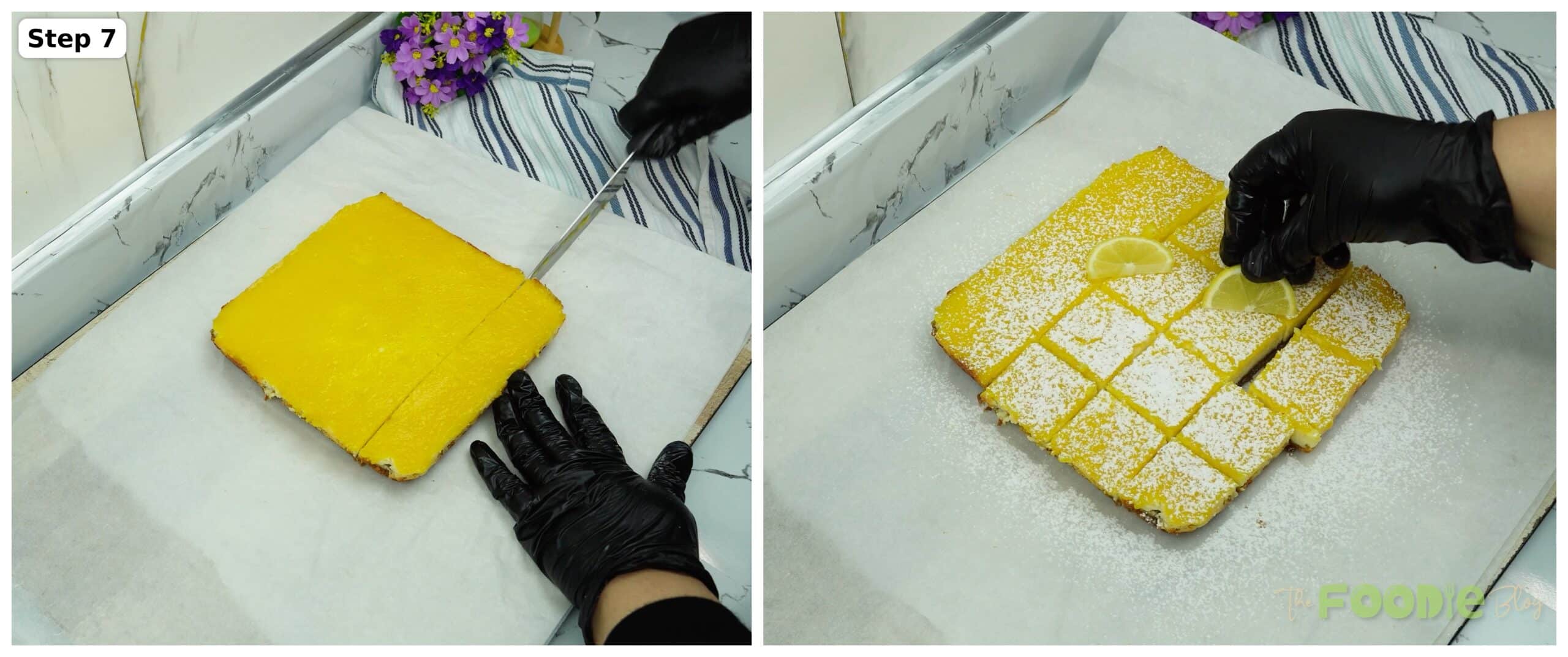 Cutting lemon cheesecake bars into squares and dusting with powdered sugar with lemon slices on top