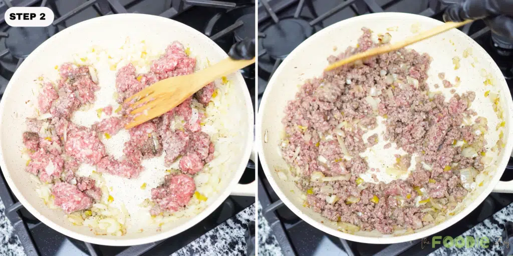 Ground meat cooking with chopped onion in a skillet
