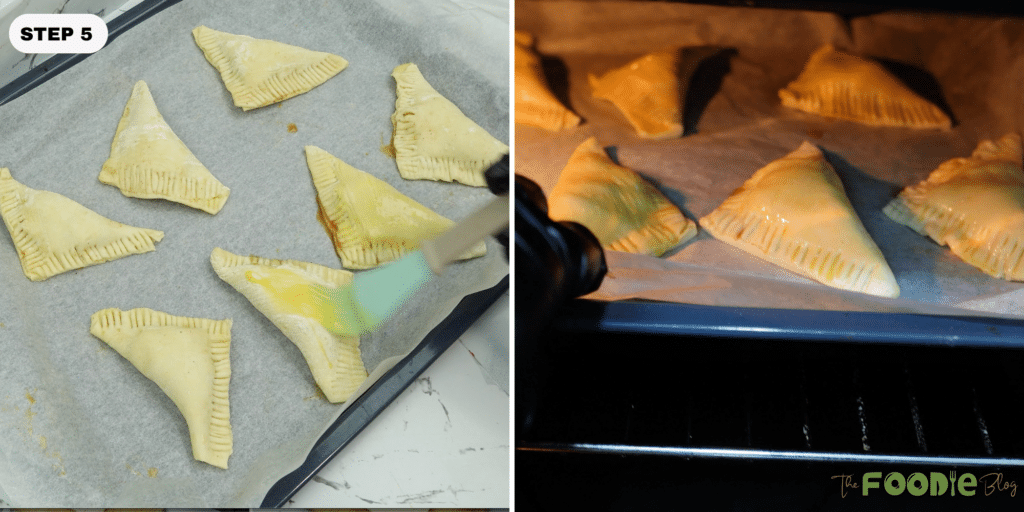 Egg wash being brushed onto chilled unbaked apple turnovers on a baking sheet