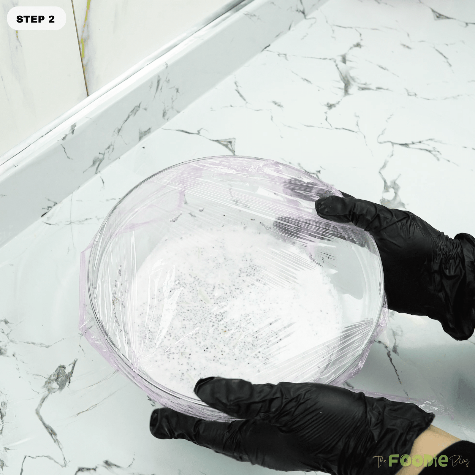 Bowl of chia mixture covered with plastic wrap