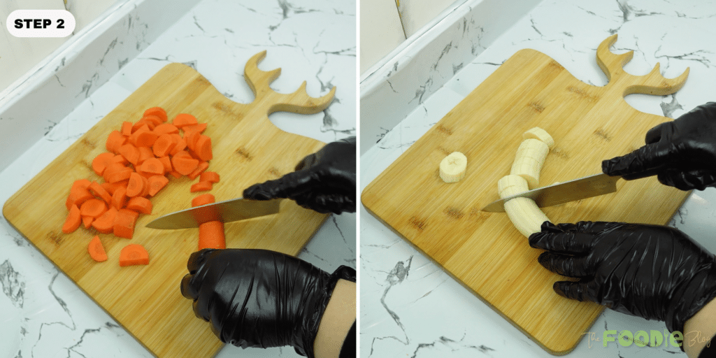 Sliced carrots and banana rounds being cut on a wooden cutting board
