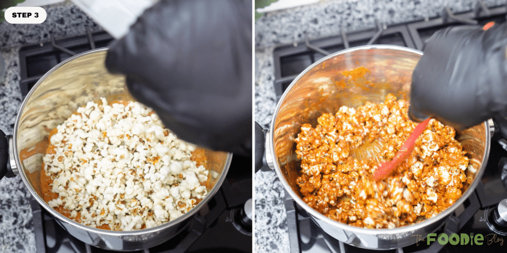 Popped corn being stirred into foamy caramel sauce in a large pot