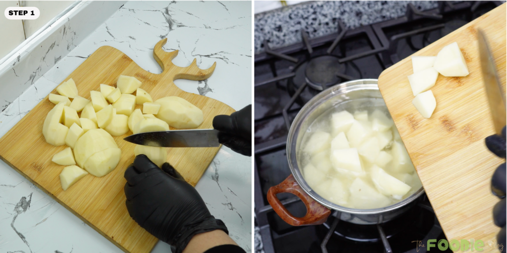 Chopped potatoes on a cutting board next to a pot of boiling water
