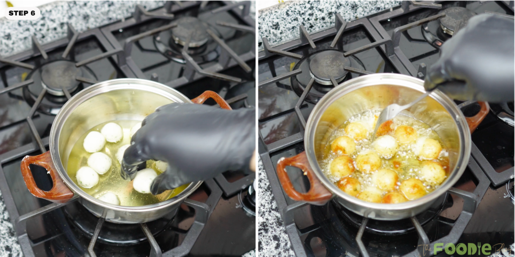 Potato balls frying in hot oil until golden brown