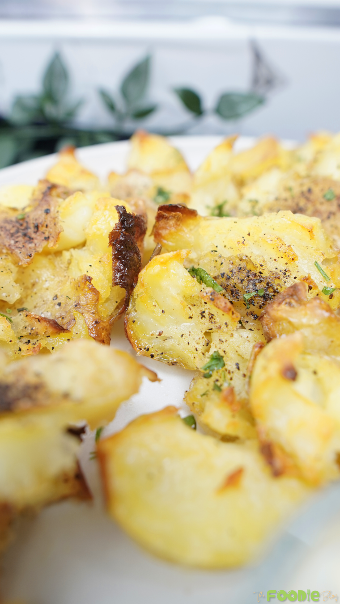 Close-up view of smashed potatoes showing crispy browned edges and soft centers