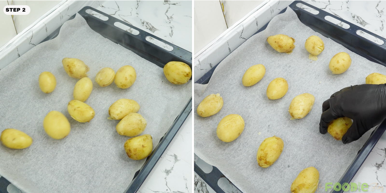 Boiled potatoes spaced out on a parchment-lined sheet pan