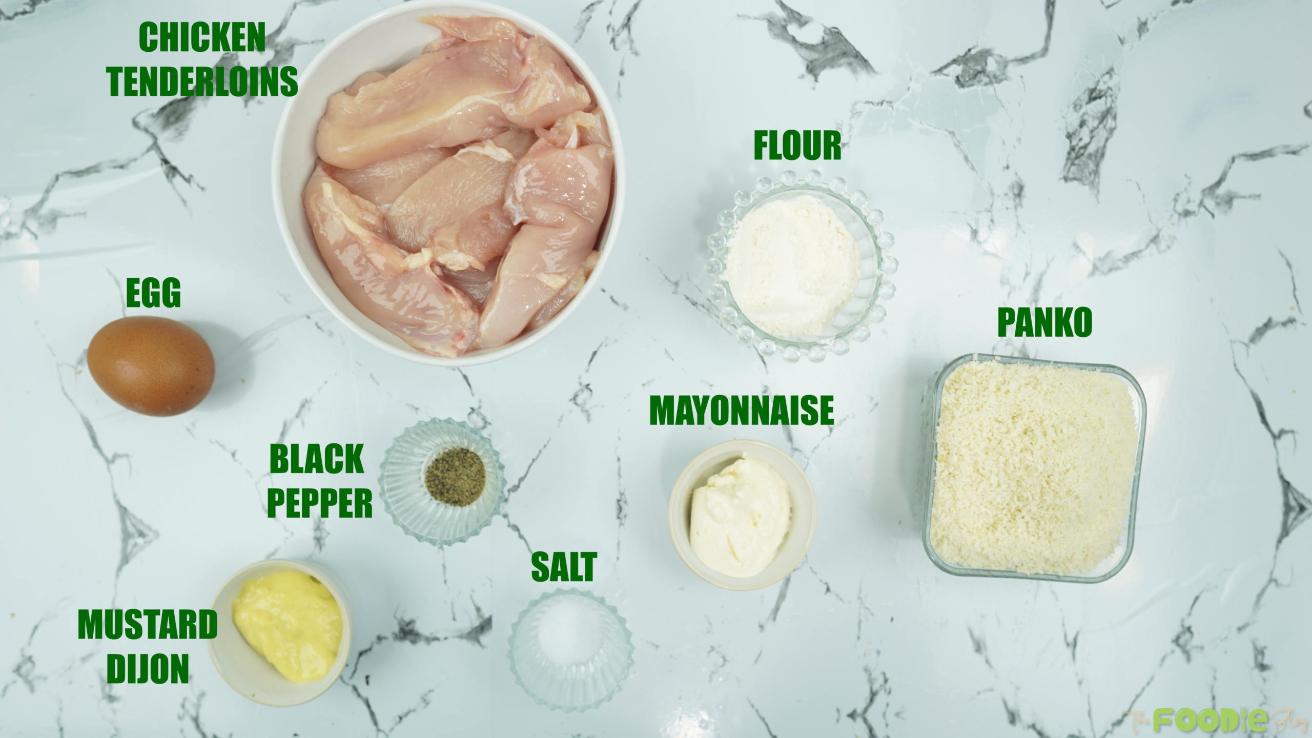 Ingredients arranged on a counter for making baked chicken tenders