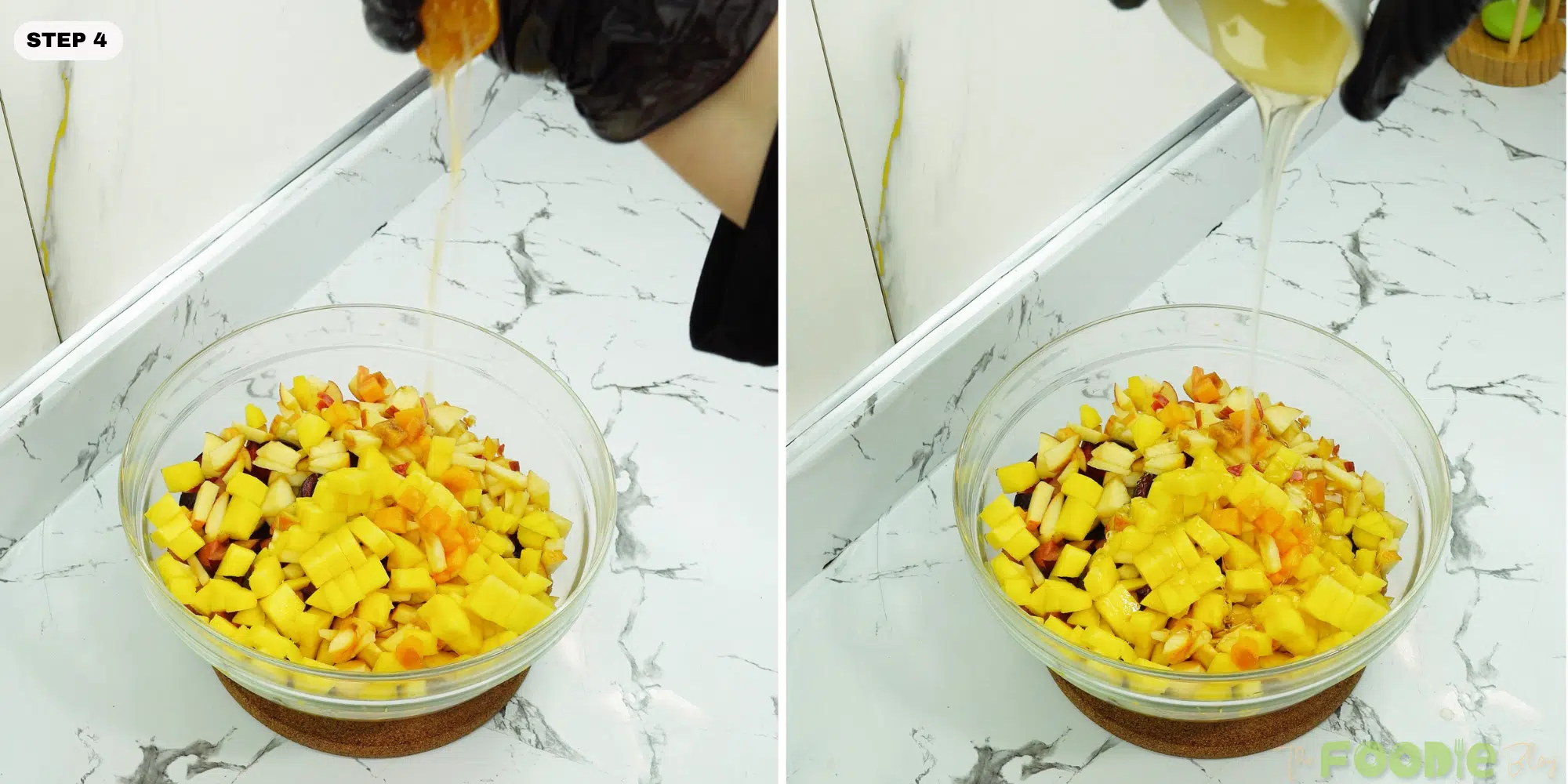 Orange juice being squeezed and honey being poured over chopped fruit in a bowl