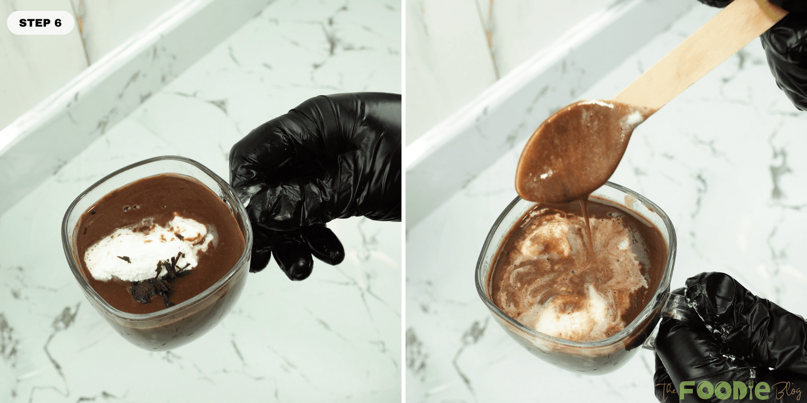 Mug of hot chocolate with whipped cream and chocolate flakes being spooned