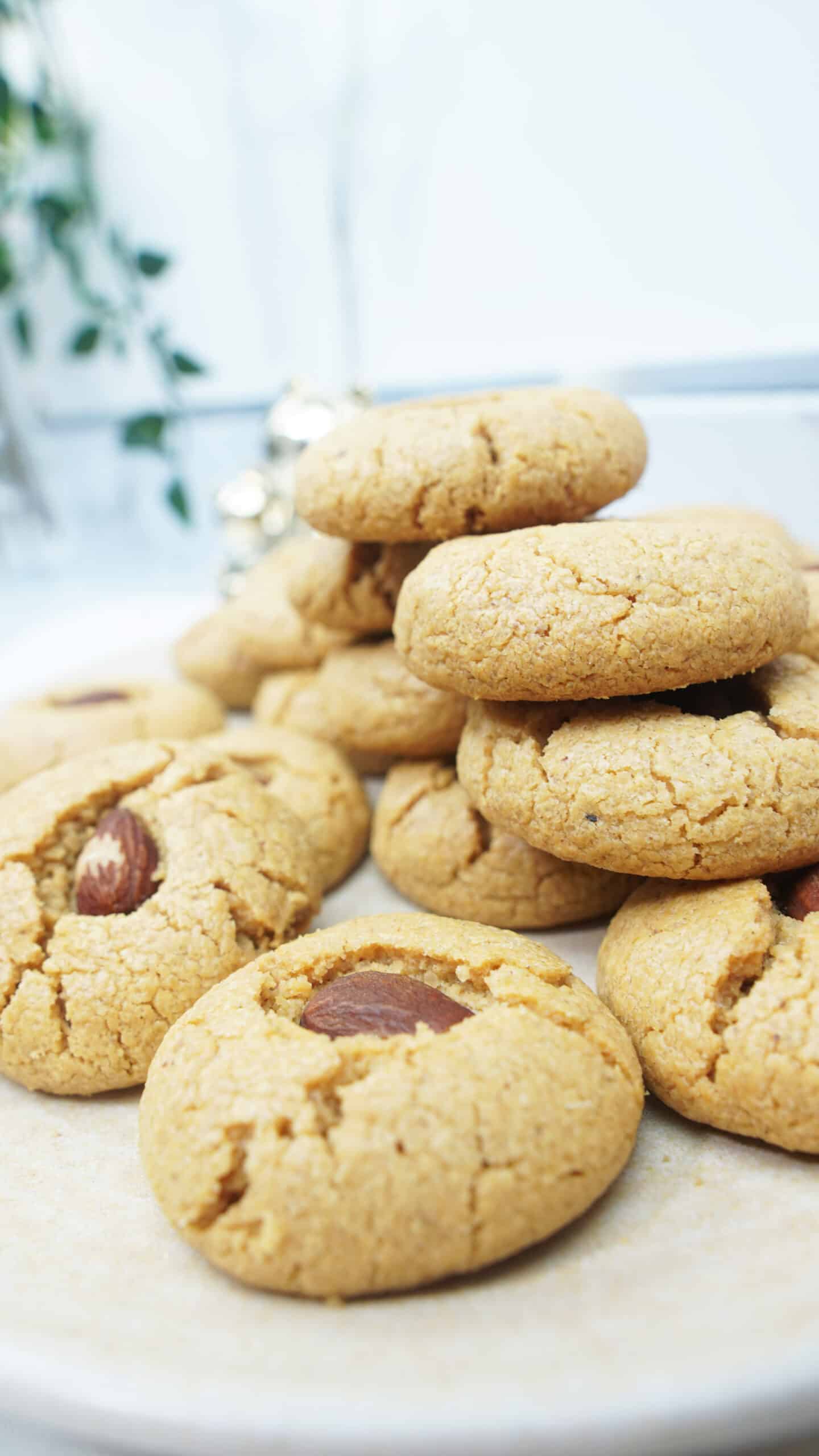 Plate of finished peanut butter cookies stacked and ready to serve