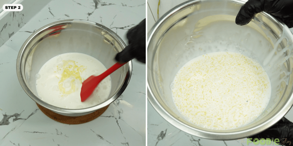 Cream mixture being stirred in a bowl with melted butter swirled in