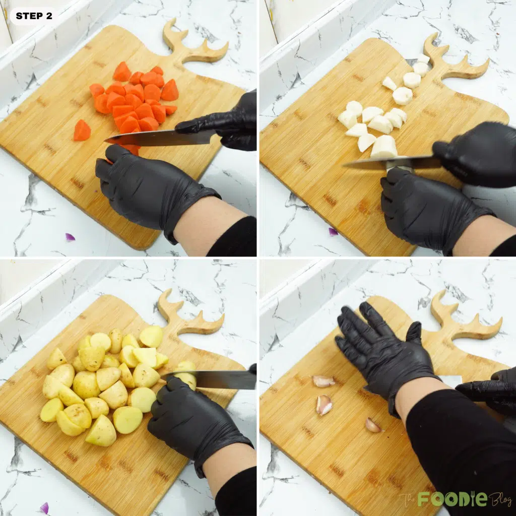 chopping carrots and parsnip on a cutting board for roasting