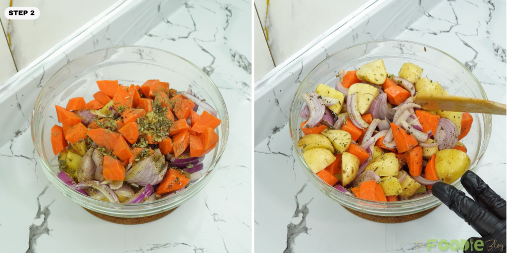 Potatoes, carrots, and red onion in a glass bowl with herbs and seasoning before mixing