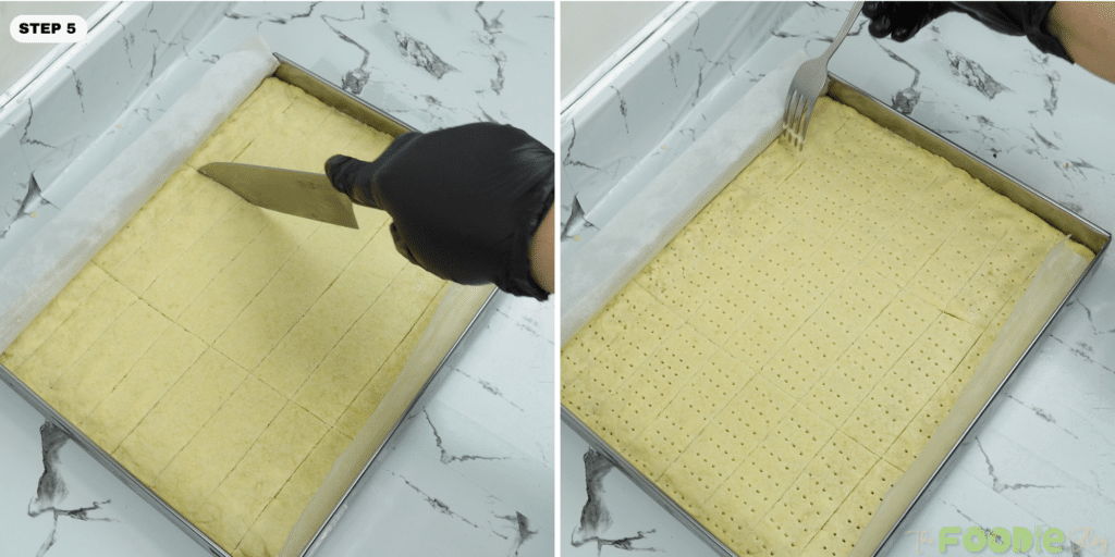 Shortbread dough scored into rectangles and pricked with a fork