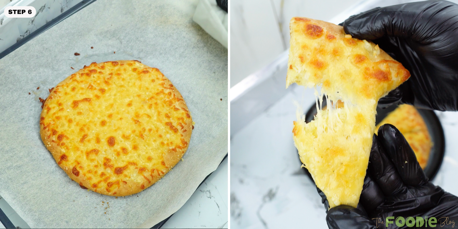 Golden baked garlic cheese bread on parchment with a slice being lifted