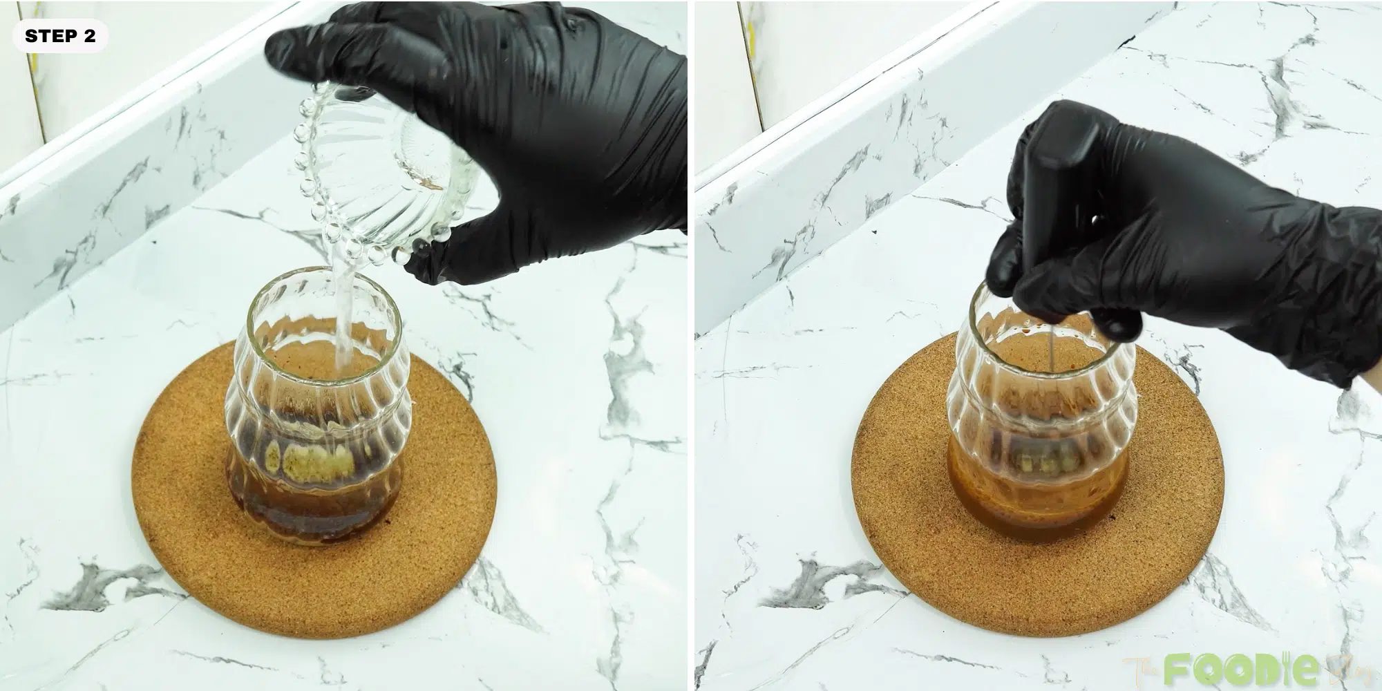 Water poured into the glass and stirred to dissolve instant coffee with sweetened milk