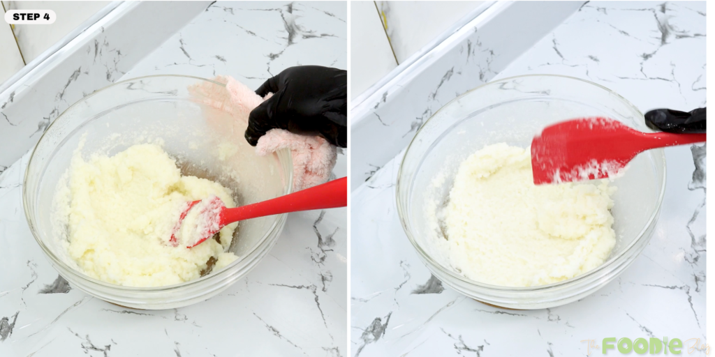 Thick coconut mixture being mixed with a spatula in a glass bowl