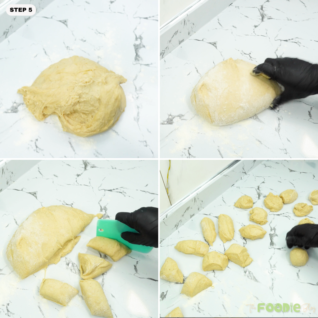 Brioche dough cut into equal pieces on a counter