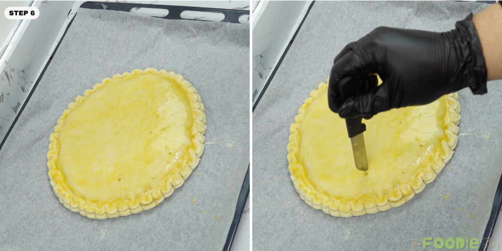 Unbaked galette brushed with egg wash and lightly scored on top before baking