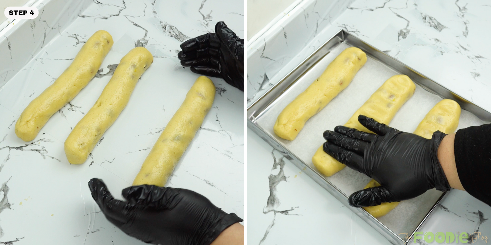Three biscotti dough logs shaped and placed on a parchment-lined pan