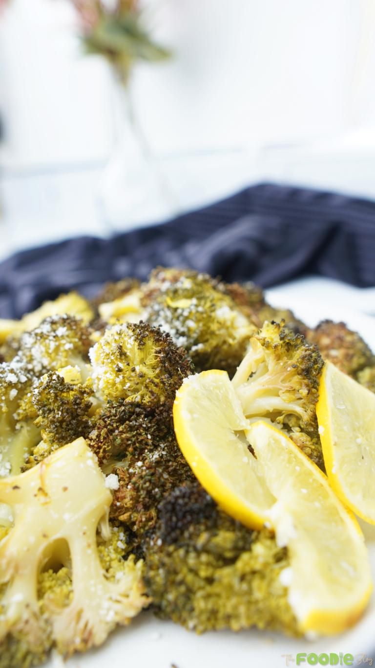 Top view of roasted broccoli with Parmesan sprinkled over the florets