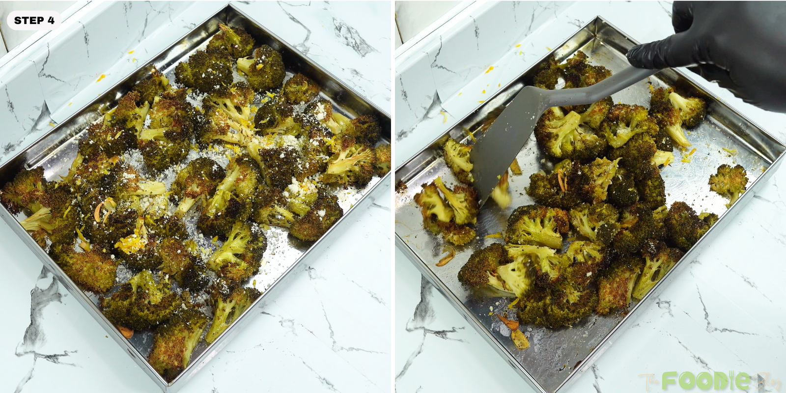 Roasted broccoli on a sheet pan being tossed with a spatula
