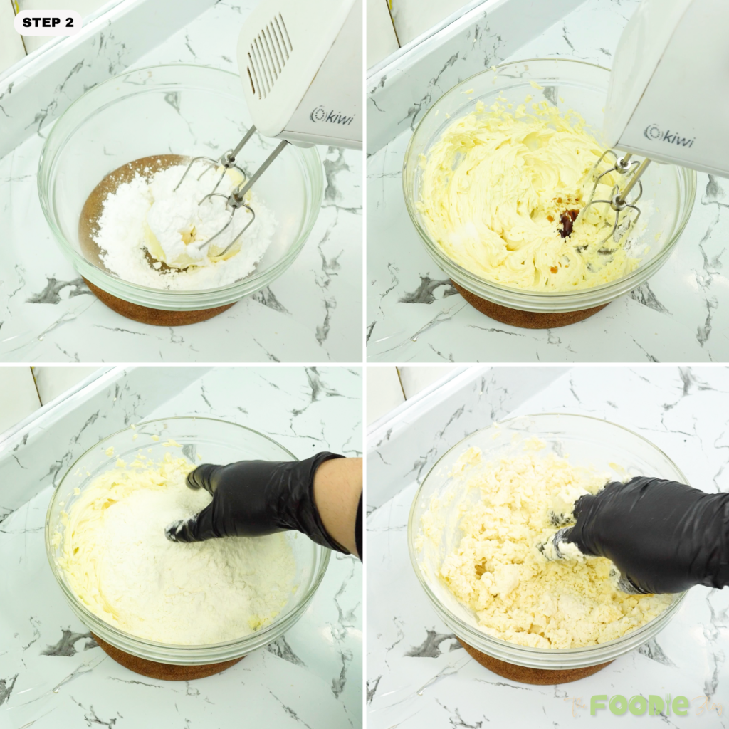Butter and powdered sugar being mixed until creamy in a glass bowl