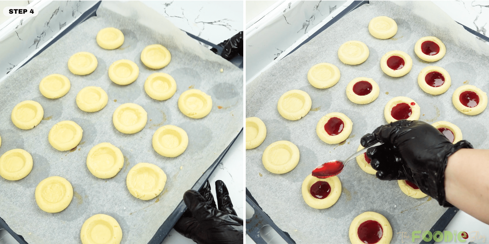 Spoon filling strawberry jam into thumbprint cookie wells on a parchment-lined cookie sheet
