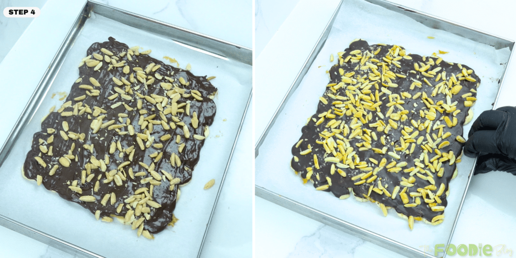 Crushed peanuts sprinkled over melted chocolate on the tray