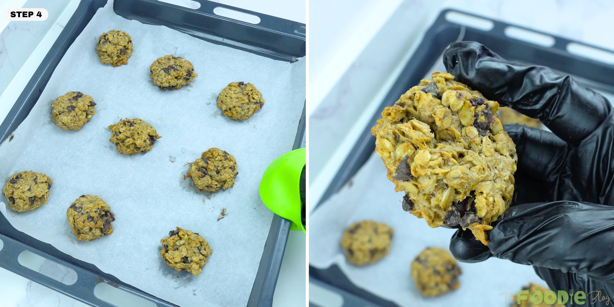 Hand holding a baked oatmeal chocolate chip cookie over a baking tray