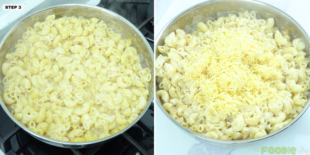 Shredded cheddar added to cooked macaroni in a pan before stirring
