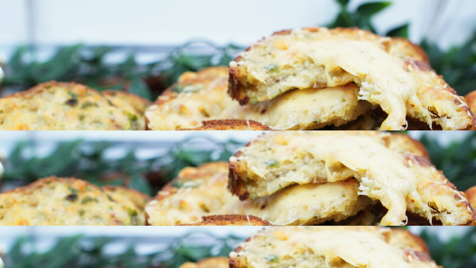 Cheesy oven baked egg toast slices stacked with melted mozzarella and herbs
