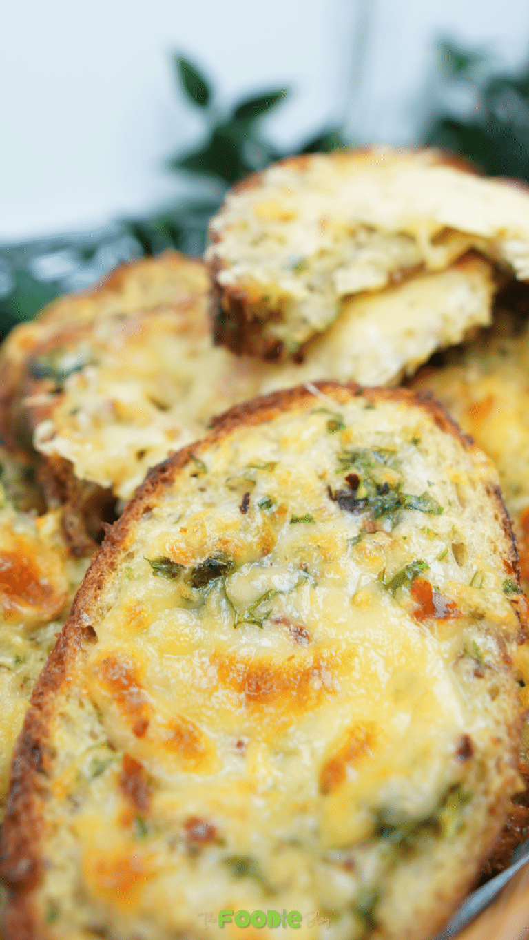Close-up of oven baked egg toast with browned mozzarella and parsley