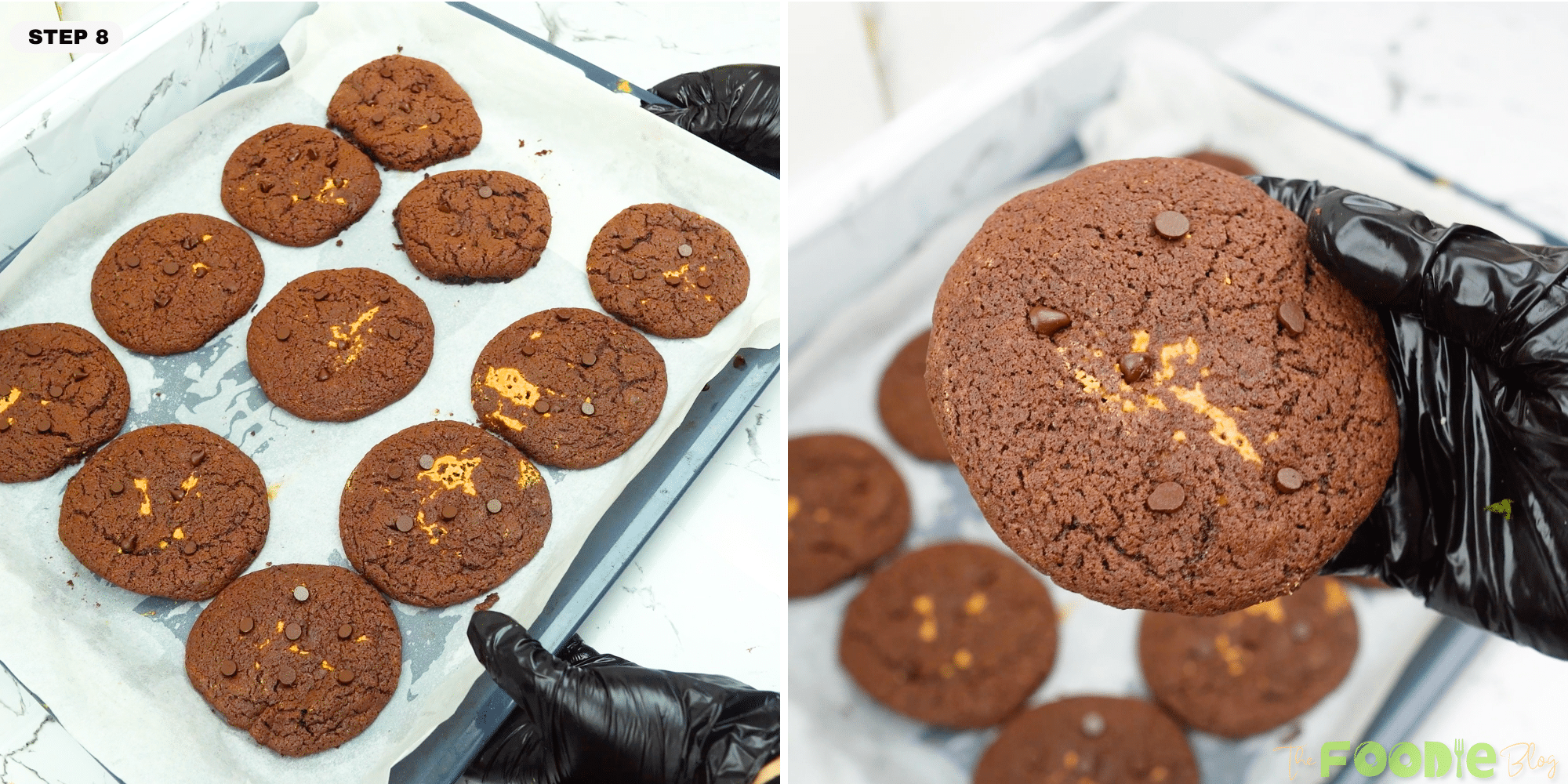 Baked chocolate peanut butter cookies on a tray with one cookie held close to the camera.