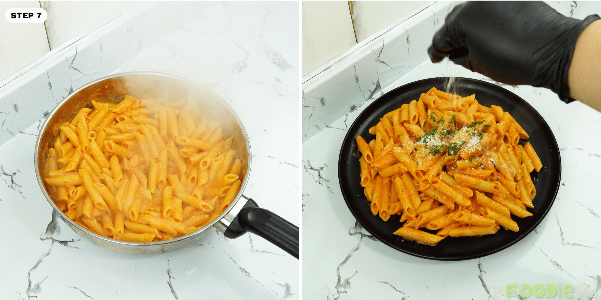 Penne alla vodka served on a black plate with Parmesan and parsley being sprinkled on top
