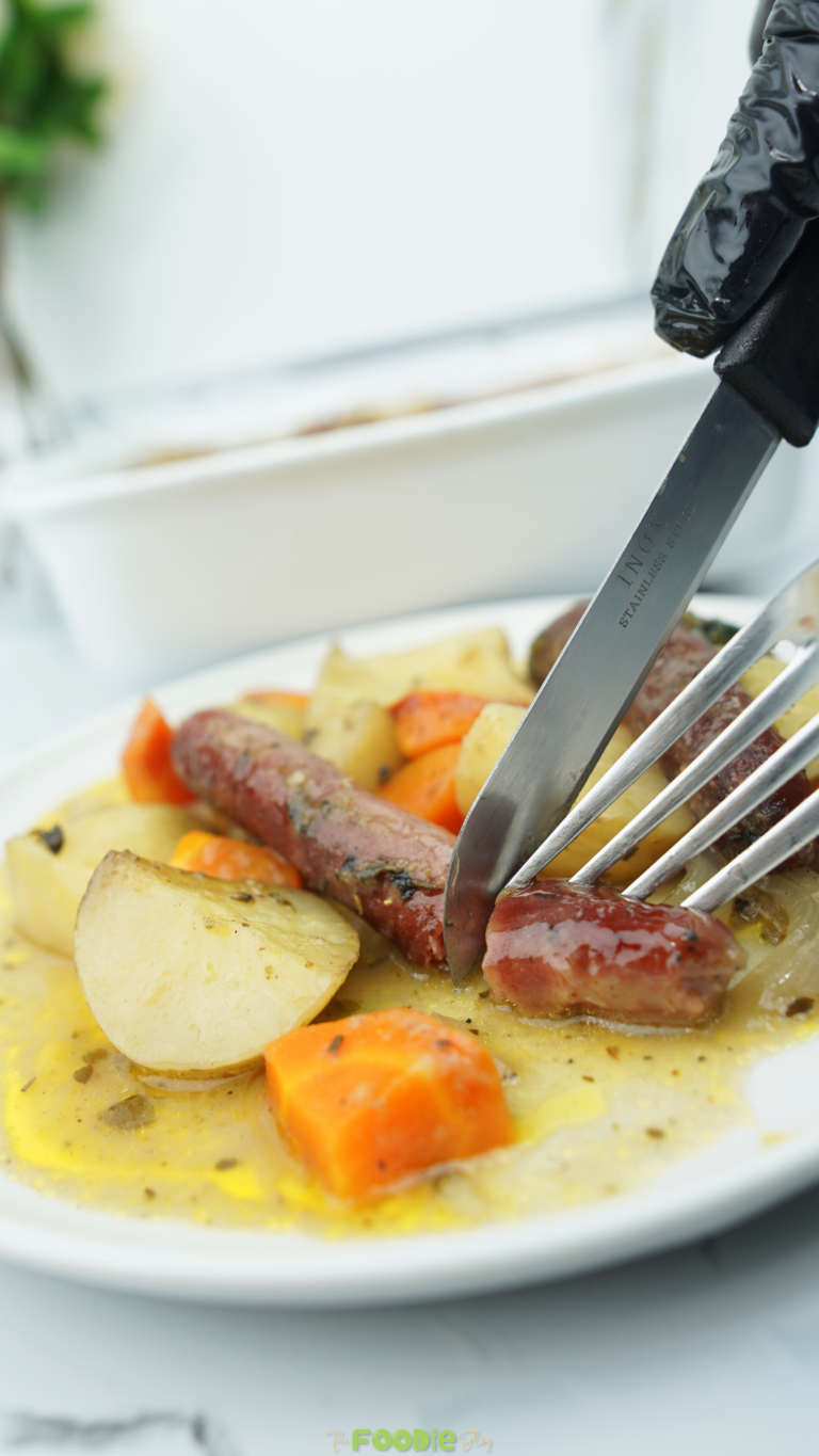 sausage bake cutting sausage closeup