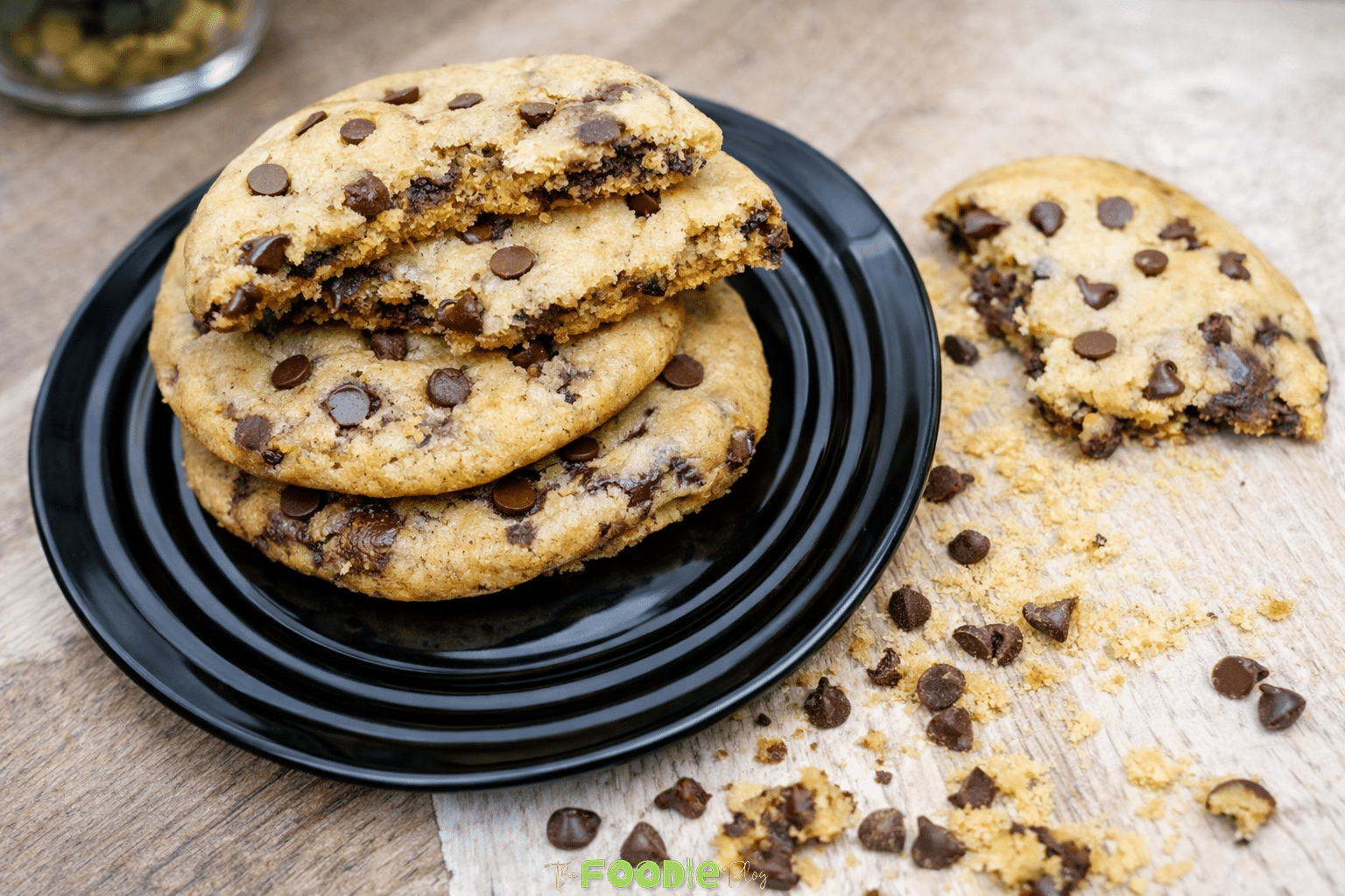 The Best Chocolate Chip Cookies Recipe stacked in a close-up view with gooey chocolate chips