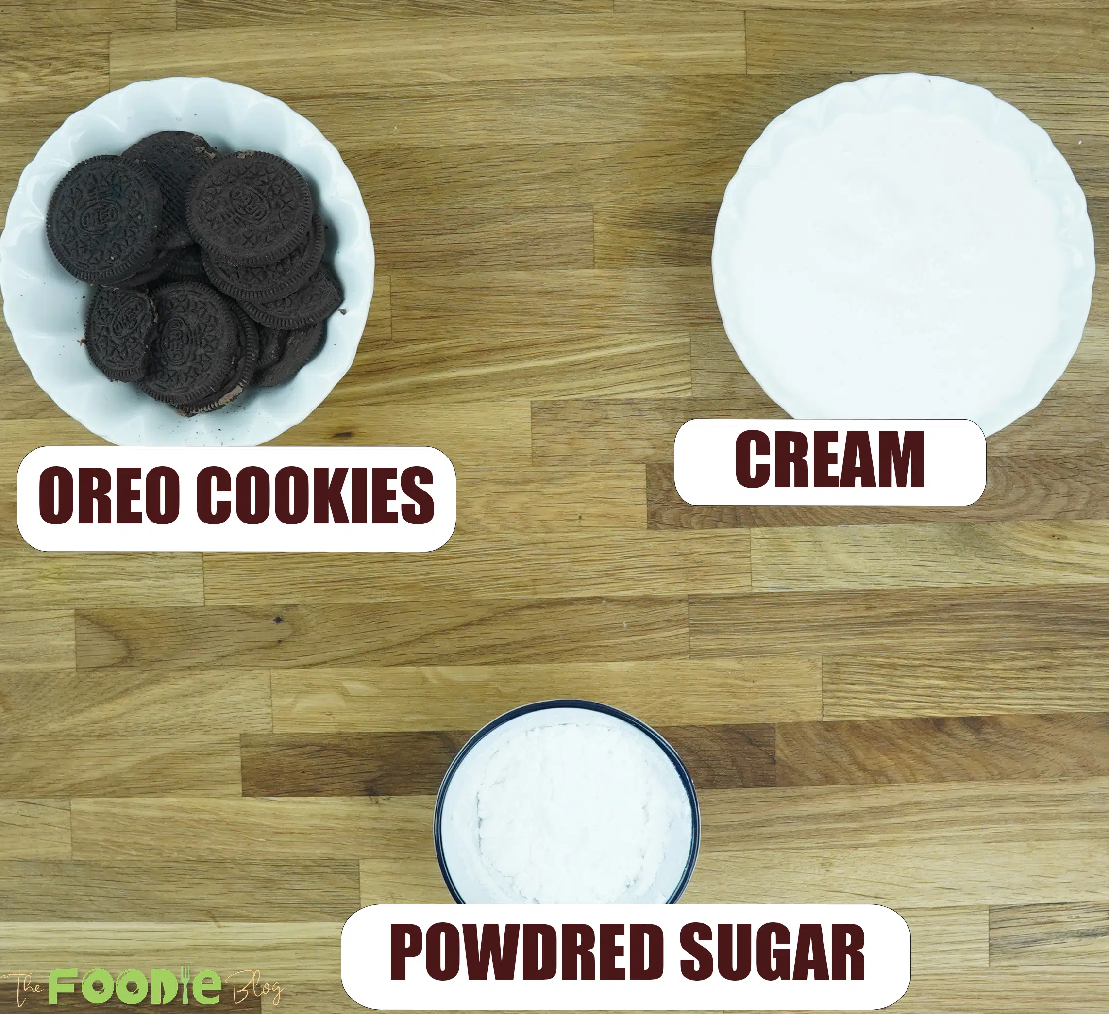 Overhead view of Oreo cookies, heavy cream, and powdered sugar for 3-Ingredient Oreo Mousse