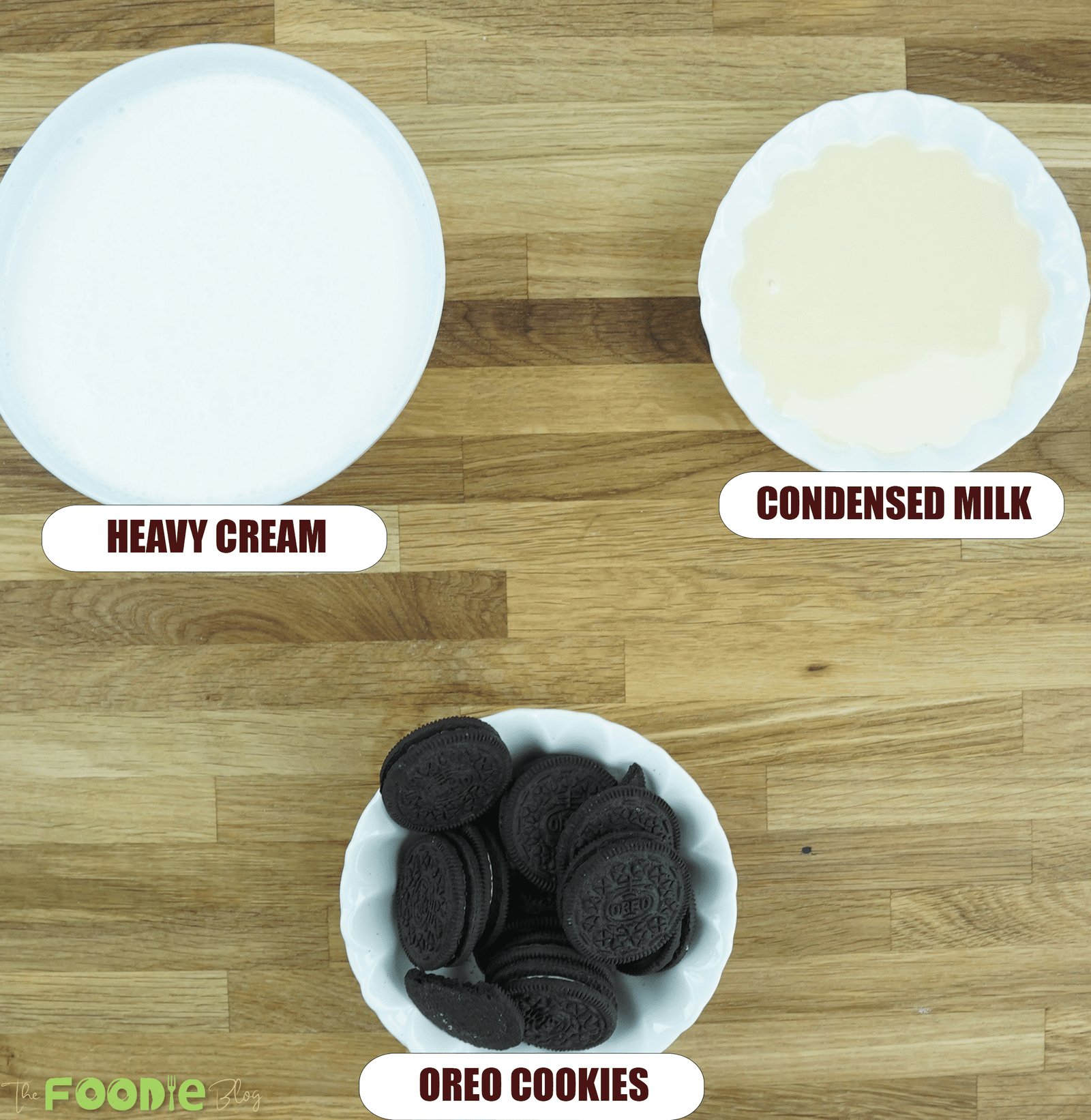 Overhead view of heavy cream, sweetened condensed milk, and Oreo cookies for easy homemade Oreo ice cream