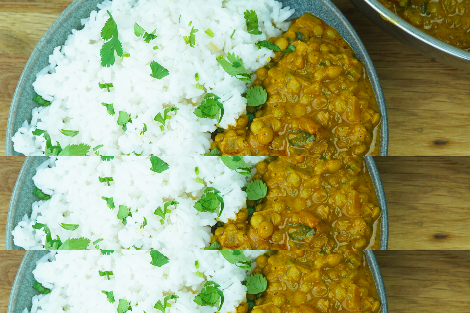 overhead view of lentil curry served with rice in a gray bowl