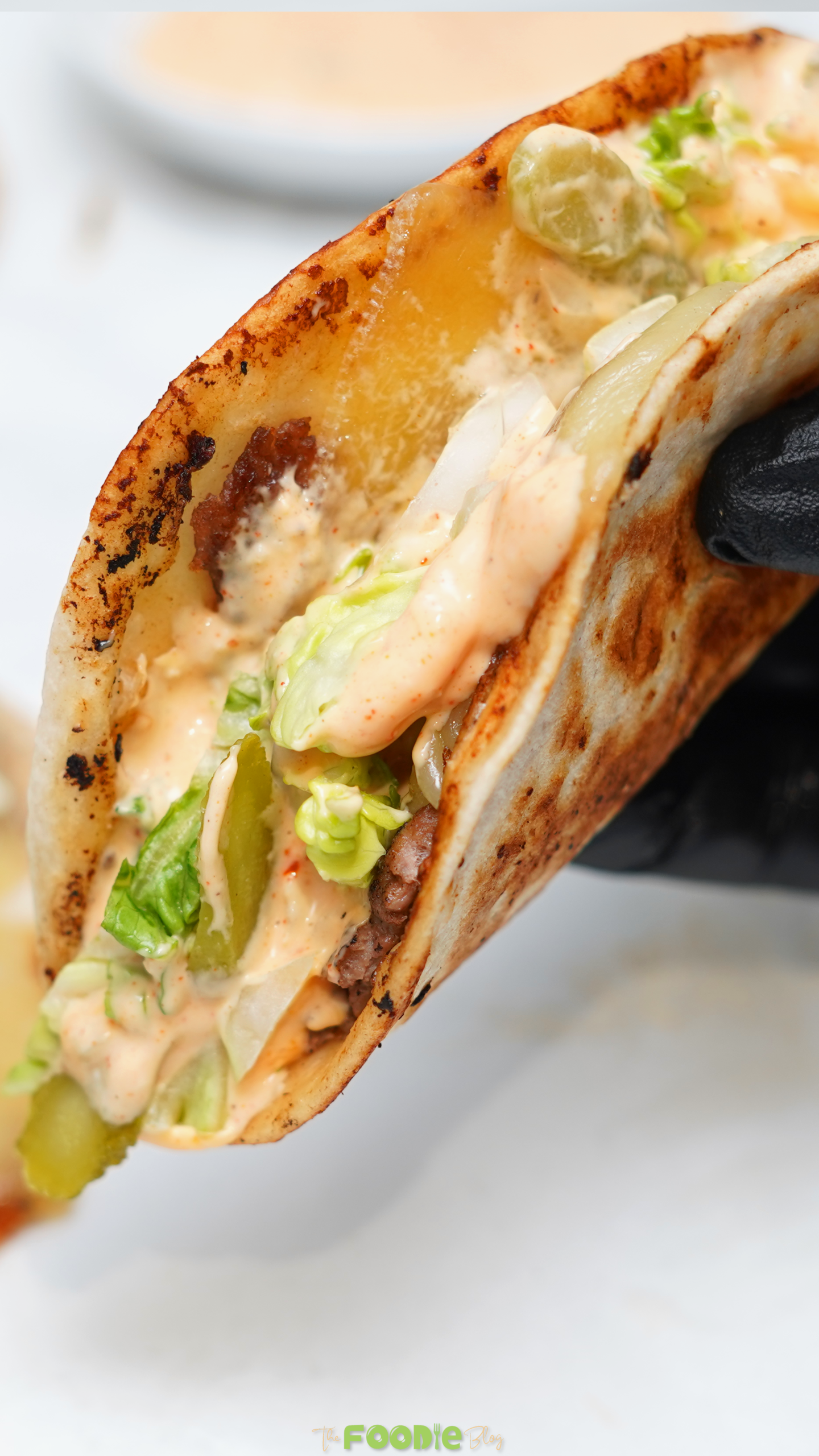 easy smash burger tacos with cheese lettuce pickles and special sauce