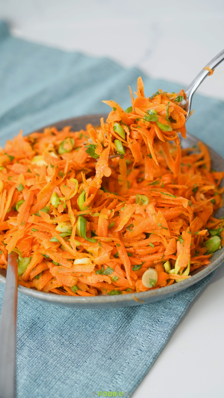 french grated carrot salad with honey dijon dressing and scallions