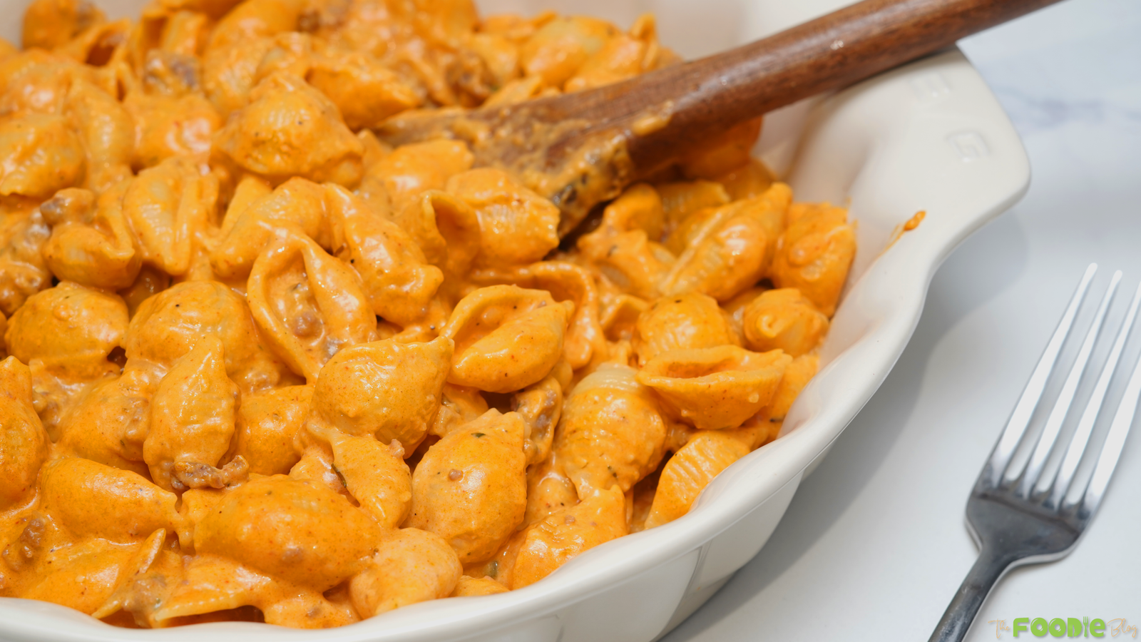 Cheesy homemade hamburger helper with shells pasta in creamy tomato sauce