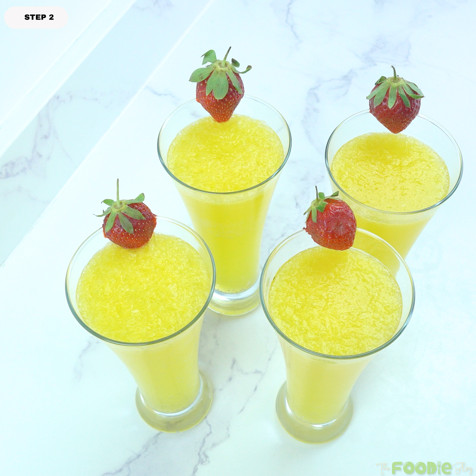 Step-by-step image of orange mimosa cocktails garnished with fresh strawberries.