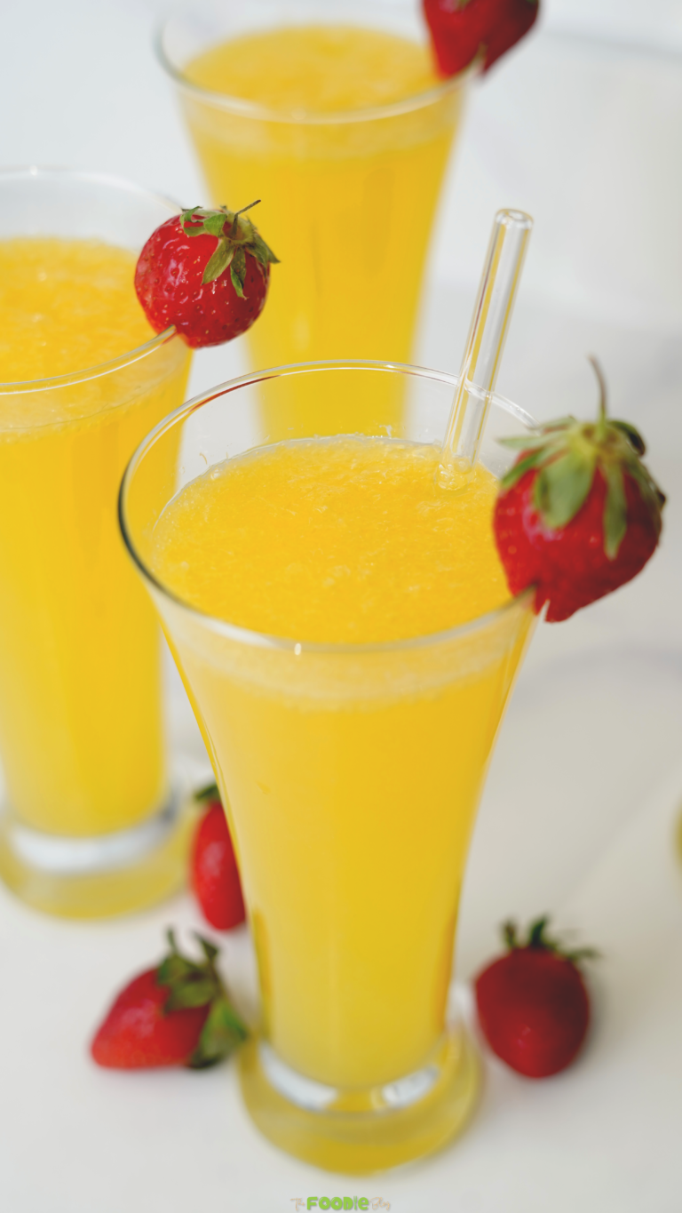 classic mimosa cocktail with orange juice and champagne