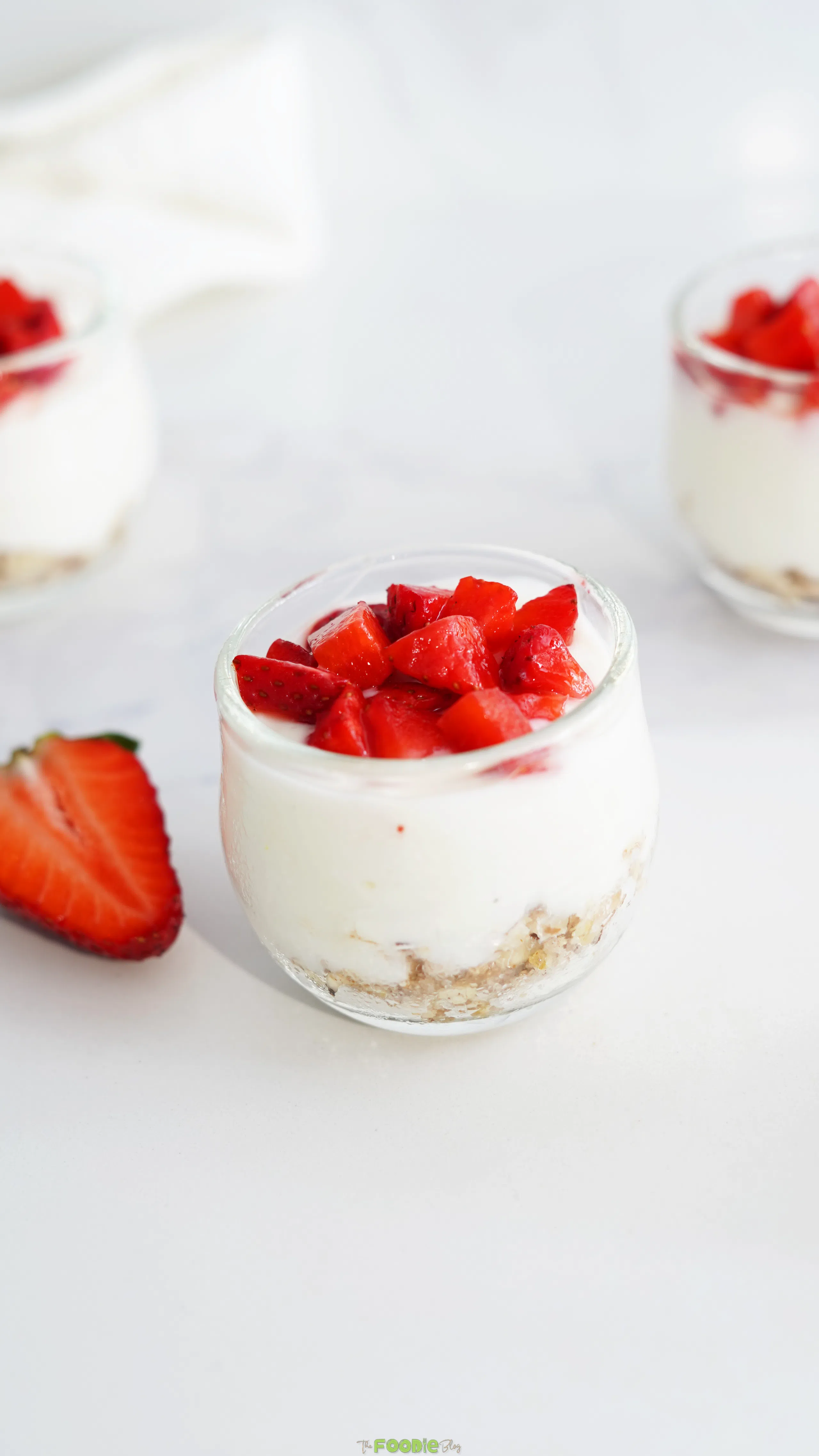 protein no bake cheesecake cups with greek yogurt and fresh strawberries