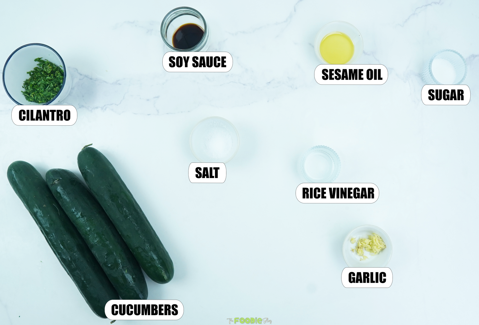 Cucumbers, cilantro, soy sauce, sesame oil, rice vinegar, ginger, sugar, and salt for smashed cucumber salad.