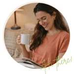 Smiling food blogger holding a white coffee mug