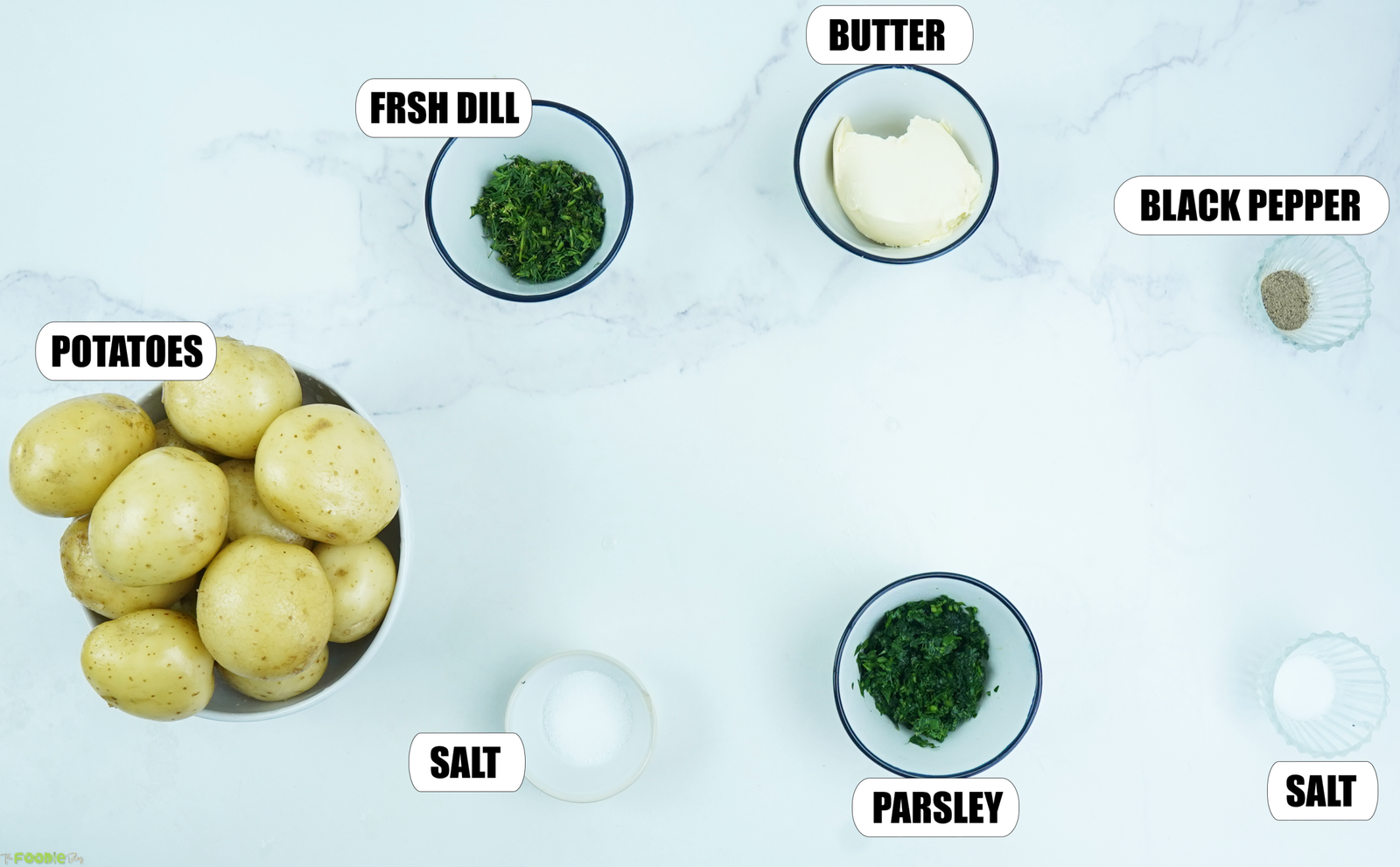 Baby potatoes boiling in salted water, then tossed with butter, salt, pepper, and fresh herbs.